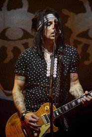 Photo of Tommy Henriksen as Self - Guitar