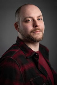 Photo of Ryan Reid as KX-01