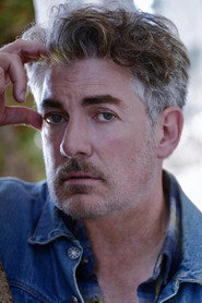 Photo of Adrian Pereira as Owain McClure