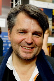 Photo of Rüdiger Suchsland as Self - Narrator (voice)