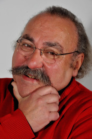 Photo of José Fanha as Rodinhas / bookseller
