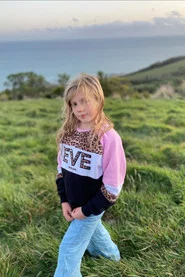 Photo of Mila Coustley as Sister
