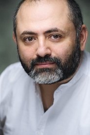 Photo of Rami Nasr as Hassan