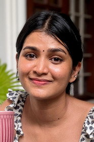 Photo of Meenakshi Unnikrishnan as Dhanya