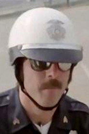 Photo of Dave Thomas as Motorcycle Cop