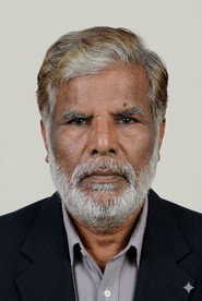 Photo of Masum Aziz as Karim Master