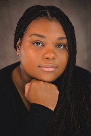 Photo of Jadashai Tami Thomas as Ms Thomas