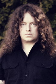 Photo of Fredrik Åkesson as Guitars, Backing Vocals