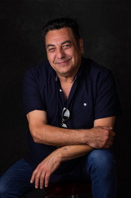 Photo of Norman Hassan as Trombón y Timbales