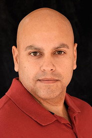 Photo of Israel Acevedo as Agent 1