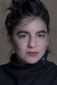 Photo of Ella Rothschild as Minister Desouza