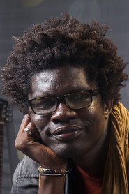 Photo of Moustapha Naham as Ousmane