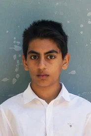 Photo of Sam Ashraf as Elias
