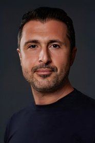 Photo of Bülent Tapıcı as Mert