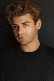 Photo of Garrett Clayton as Sean Paul Lockhart / Brent Corrigan