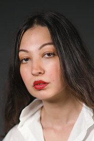 Photo of Rubya Chaudhry as Roxy