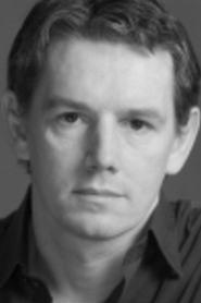 Photo of Andrew Flanagan as Duggal