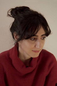 Photo of Glykeria Patramani as Rachel - TV Anchor