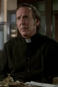 Photo of Neil Foster as Examineur Smith
