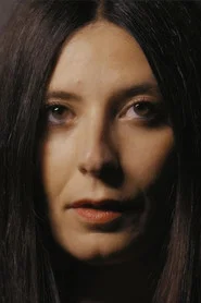Photo of Alessia Rubini as Carole Simmons