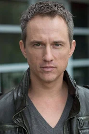 Photo of Daniel Arnold as Derek