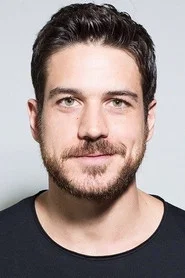 Photo of Marco Pigossi as José Ribamar do Carmo (Zeca)
