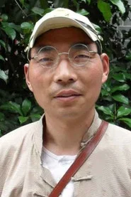 Photo of Liu Zhanling as Funeral clothing store owner