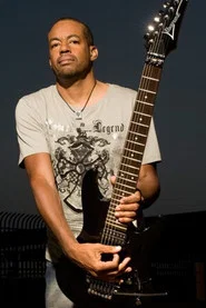 Photo of Tony MacAlpine as Self - Guitars