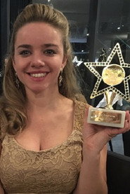 Photo of Liz McMullen as Mission Control (voice)