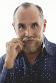 Photo of Amancio Orta as Carlo