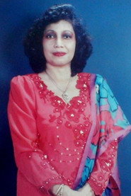 Photo of Julie Faridah as Rina
