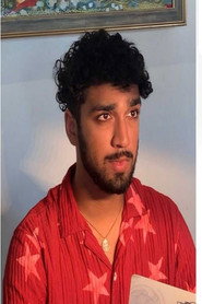 Photo of Roosevelt D'Souza as Neil Fernandes