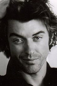 Photo of Dean Slater as Warder Fourie