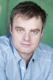 Photo of Damien Richardson as Drew Greer