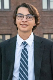 Photo of Phillip Samaniego as Reggie Burbank