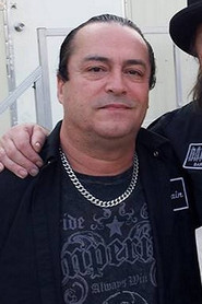 Photo of Juan Croucier as Bass