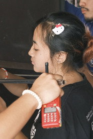 Photo of Supawee Kittikalyawong as Rin's Co-Worker, Student 2 (Voice)