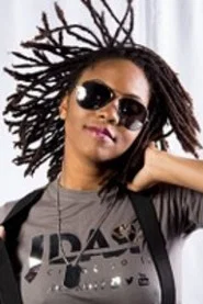 Photo of Aisha Ricketts as The Head (Voice)