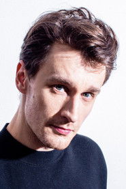 Photo of Adrian Brząkała as Priest Michał