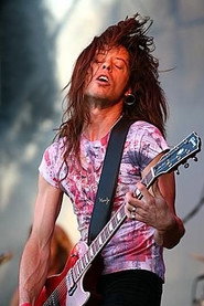 Photo of Jamie Law as Guitars