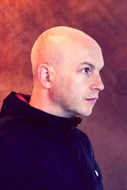 Photo of John McCusker as fiddle, cittern