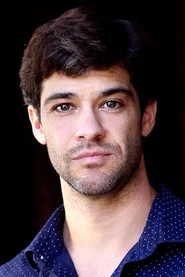 Photo of Travis Laughlin as Alex