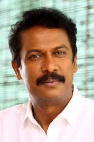Photo of Samuthirakani as Dhanapal