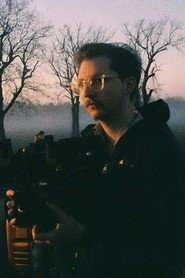 Photo of Devin Morgan as Photographer