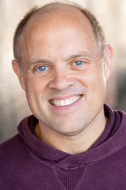Photo of Jim Woods as Coach Ulysses