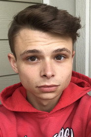 Photo of Austin Young as Elder Xanders