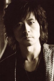 Photo of Hidehiko Hoshino as Self - Guitar