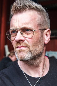 Photo of Micke Syd Andersson as Self - Drums, Backing Vocals, Guitar