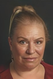 Photo of Gülümser Gülhan as Petra Yılmaztürk