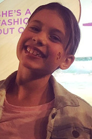 Photo of Avani Farriss as Young Cora
